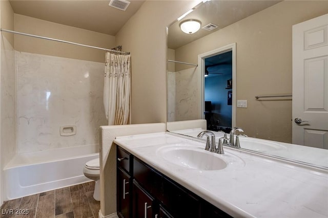 full bathroom with toilet, shower / bath combo, visible vents, and wood tiled floor