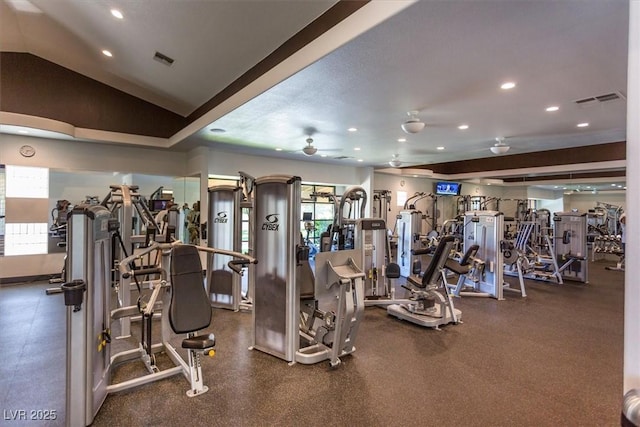 workout area featuring a ceiling fan, vaulted ceiling, recessed lighting, and visible vents