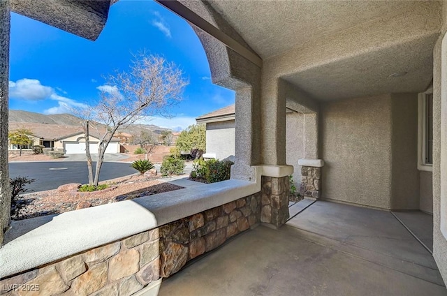 view of patio featuring a mountain view