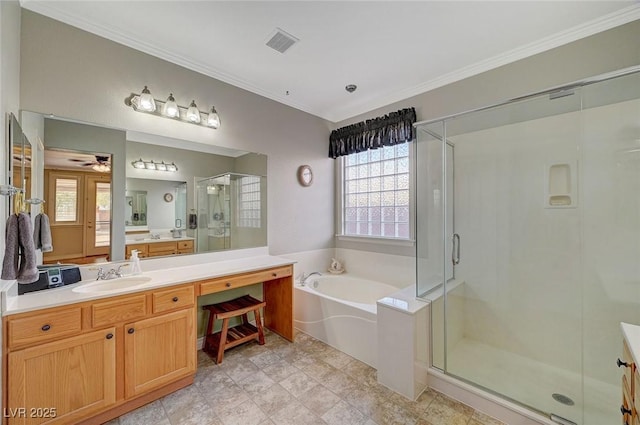 bathroom with vanity, a ceiling fan, visible vents, a shower stall, and a bath