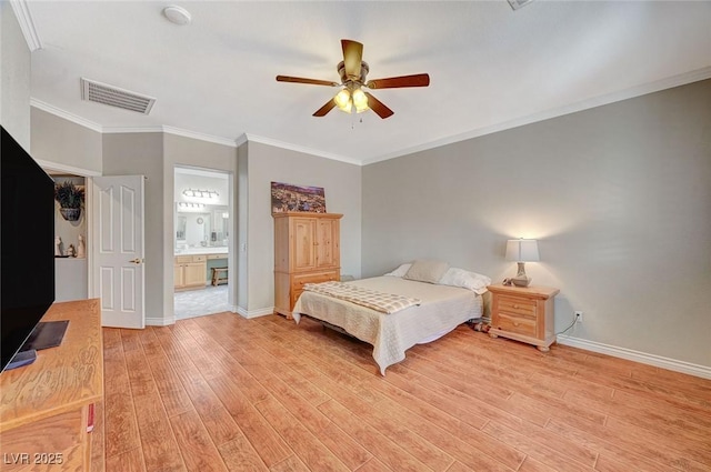 bedroom featuring light wood-type flooring, visible vents, ornamental molding, connected bathroom, and baseboards