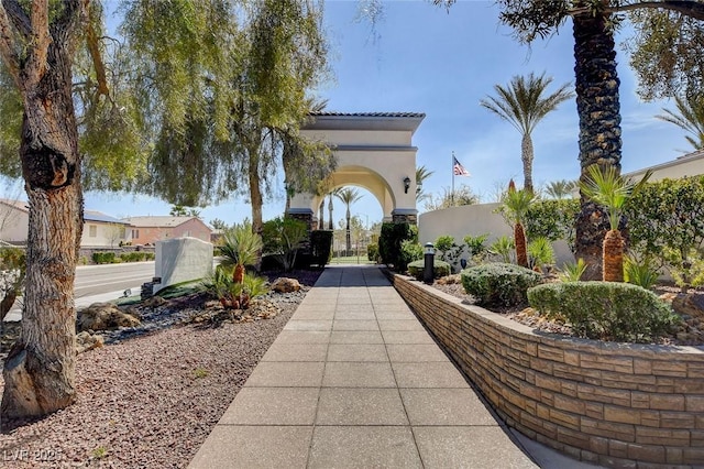 surrounding community featuring a gate and fence