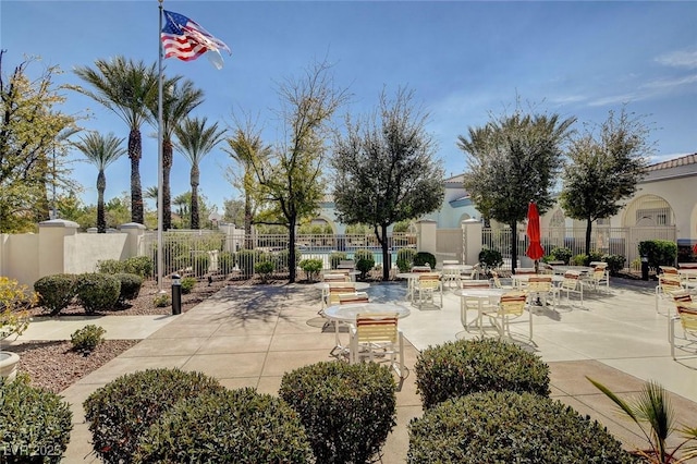 view of patio / terrace featuring fence