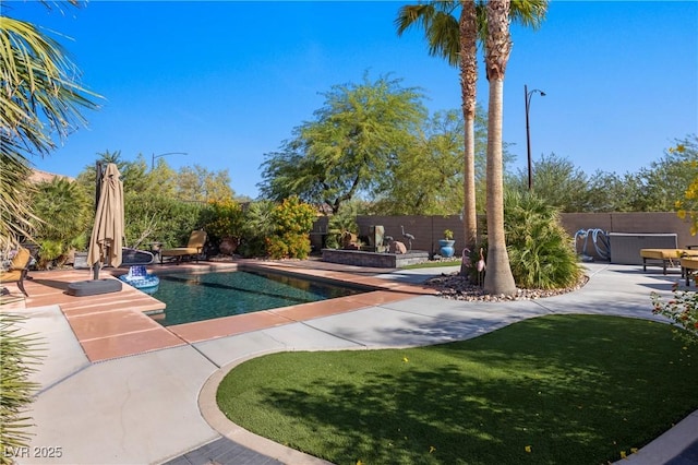 view of pool with a fenced backyard, a fenced in pool, and a patio