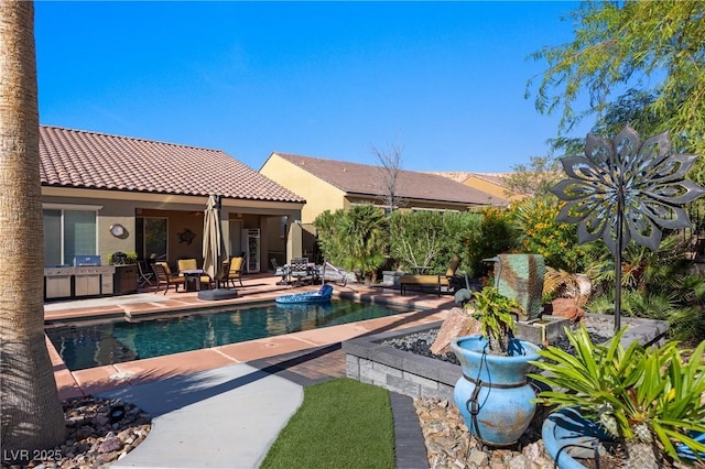 pool featuring a patio area