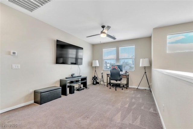 office area featuring visible vents, baseboards, a ceiling fan, and carpet floors