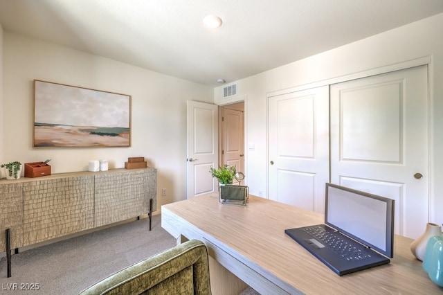 office featuring visible vents and carpet