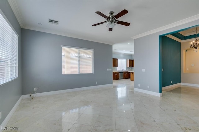 unfurnished living room with visible vents, baseboards, ornamental molding, and ceiling fan with notable chandelier