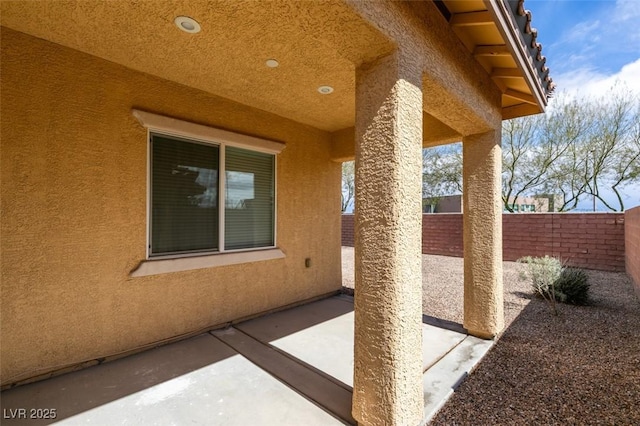 view of patio with fence