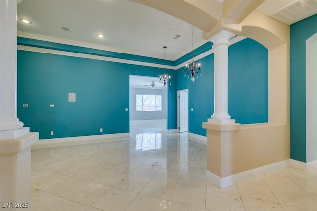 empty room featuring a chandelier, visible vents, baseboards, and decorative columns