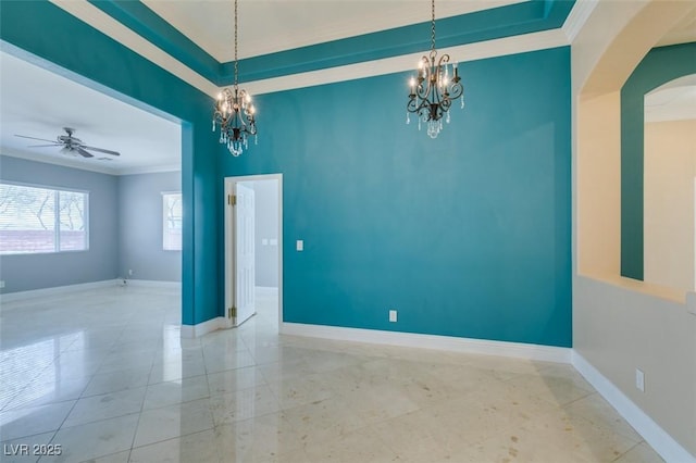 spare room with baseboards, arched walkways, crown molding, and ceiling fan with notable chandelier