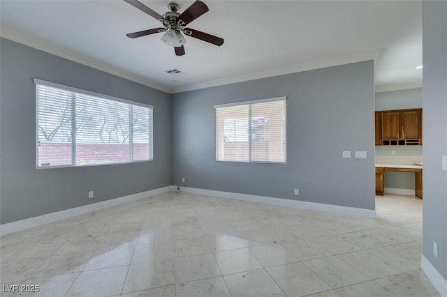 unfurnished room with a ceiling fan, crown molding, baseboards, and visible vents