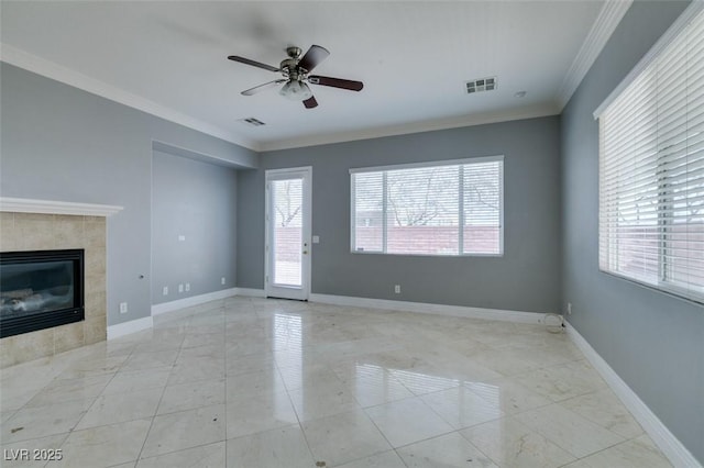 unfurnished living room with visible vents, baseboards, and ornamental molding