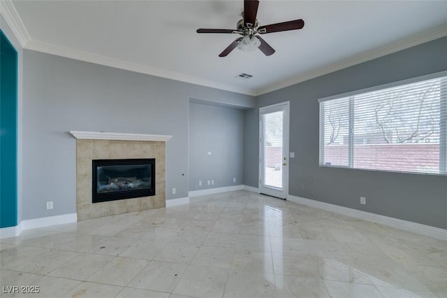 unfurnished living room with a ceiling fan, baseboards, visible vents, a fireplace, and ornamental molding