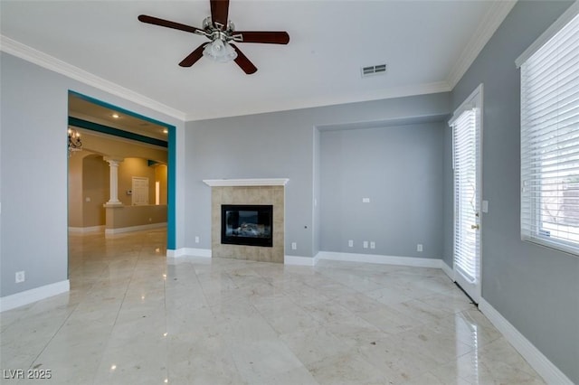 unfurnished living room featuring a ceiling fan, visible vents, and baseboards