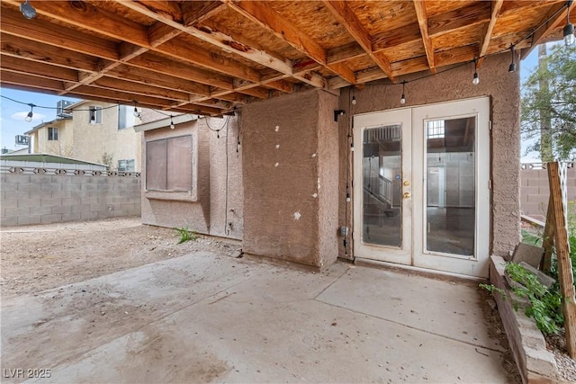 view of patio / terrace featuring fence