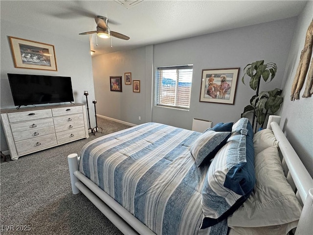 carpeted bedroom with baseboards and a ceiling fan