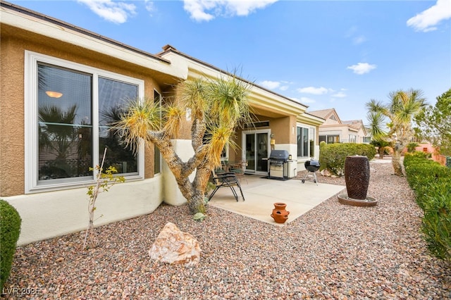 view of patio / terrace featuring a grill