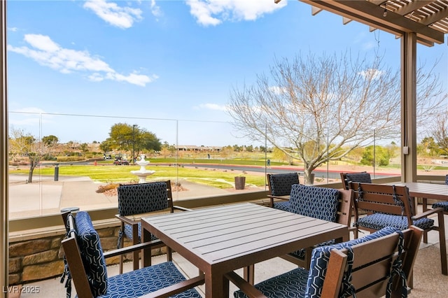 view of patio / terrace featuring outdoor dining space and a pergola