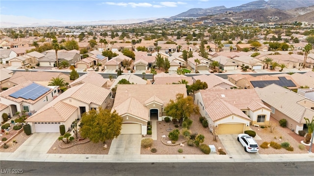 birds eye view of property featuring a residential view and a mountain view