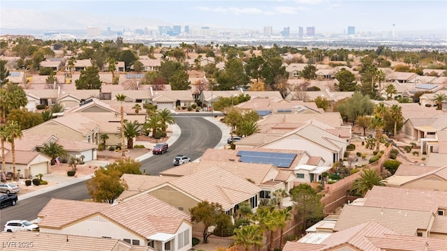 birds eye view of property with a city view and a residential view