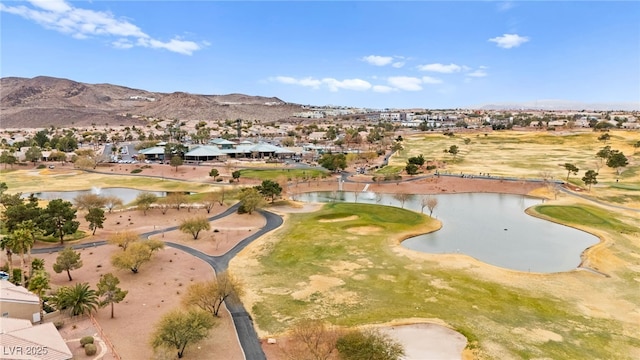 birds eye view of property with a residential view and a water and mountain view