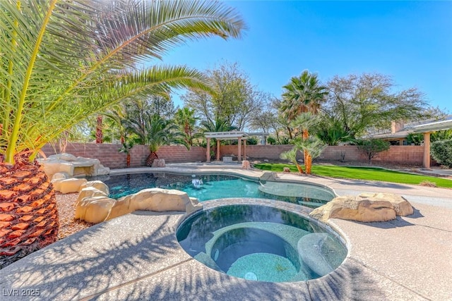 view of pool featuring a pool with connected hot tub, a pergola, and a fenced backyard