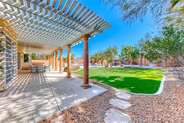 view of yard with a patio, a fenced backyard, and a pergola