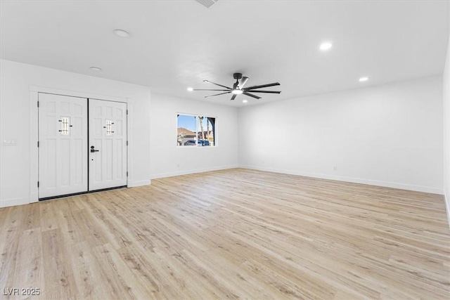 interior space featuring recessed lighting, light wood-type flooring, baseboards, and ceiling fan