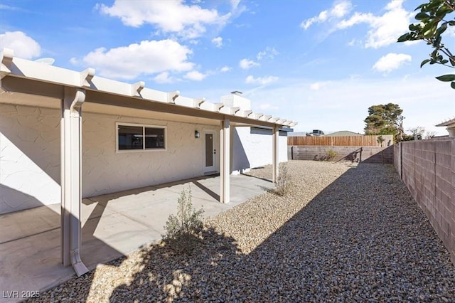 view of yard featuring a patio area and a fenced backyard