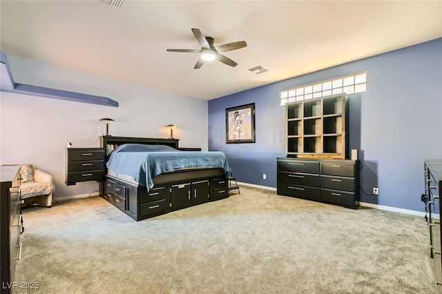 bedroom with visible vents, baseboards, carpet, and ceiling fan