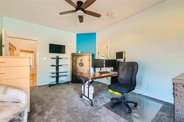 home office with carpet flooring, baseboards, and ceiling fan