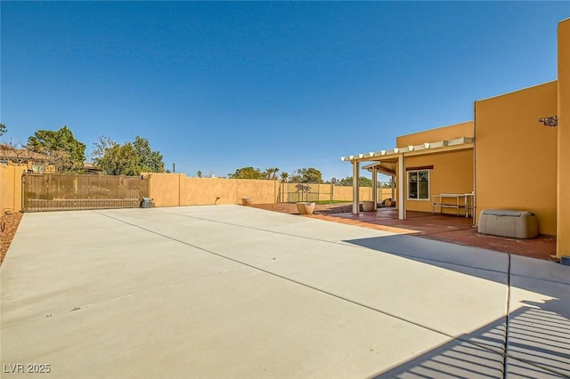 view of patio / terrace featuring fence