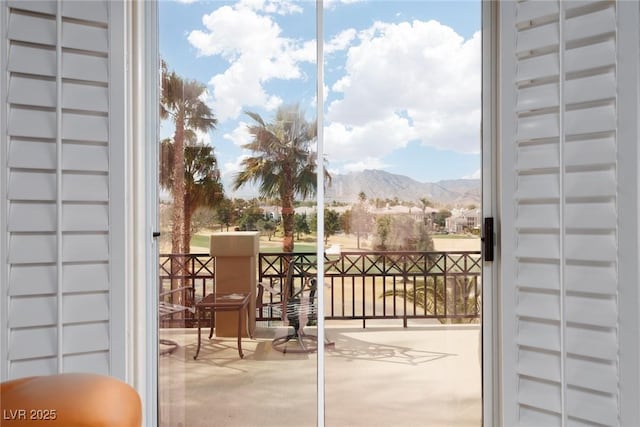 balcony featuring a mountain view