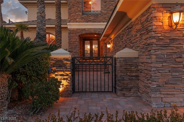 view of gate with french doors