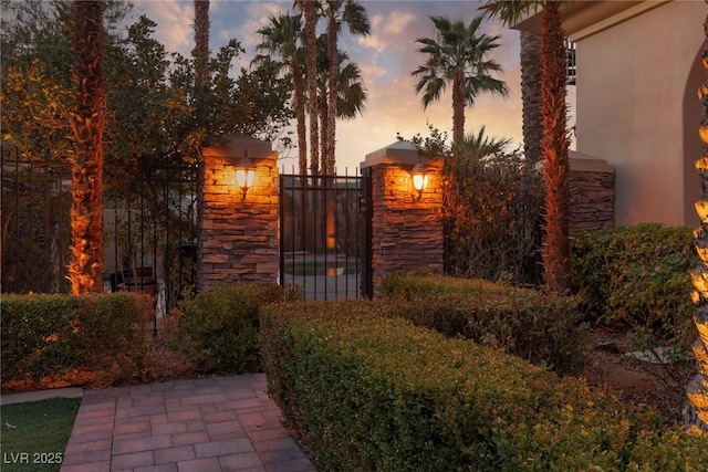 view of gate featuring fence