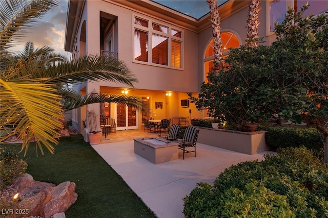 view of patio / terrace with a fire pit