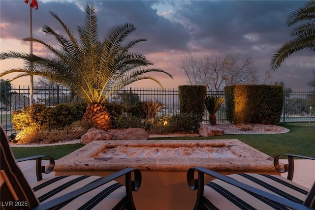 view of patio featuring fence