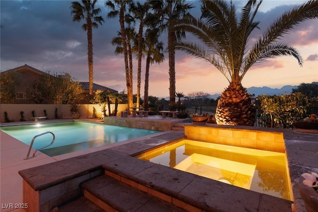 view of swimming pool with a patio, a fenced backyard, and a fenced in pool