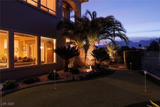 yard at dusk with fence