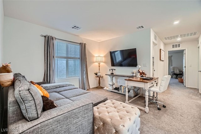 carpeted living room featuring baseboards and visible vents