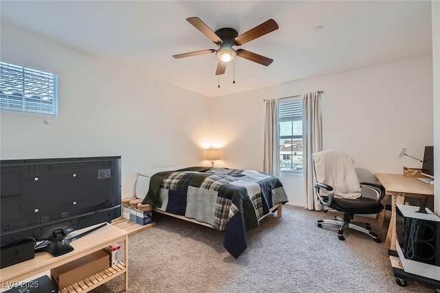 carpeted bedroom featuring a ceiling fan