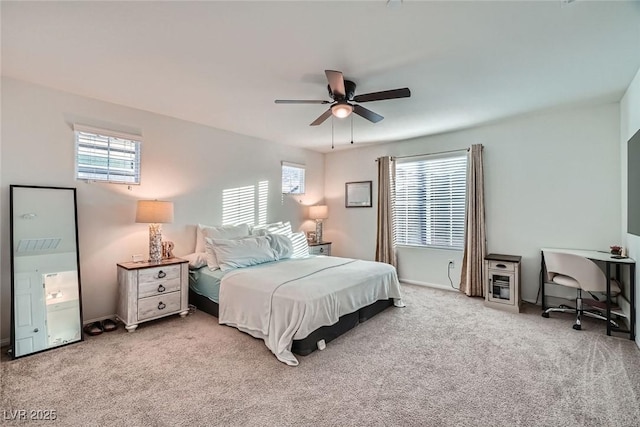 bedroom featuring a ceiling fan and carpet