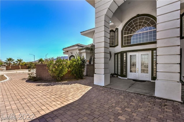 doorway to property featuring french doors