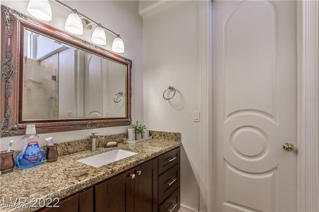 bathroom featuring vanity and walk in shower