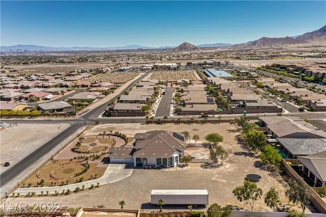 bird's eye view featuring a mountain view and a residential view