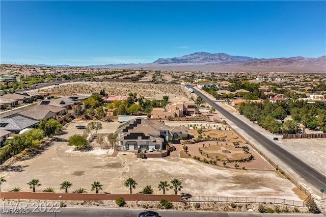 drone / aerial view with a mountain view and a residential view