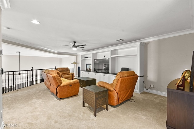 living room with visible vents, a ceiling fan, light colored carpet, and ornamental molding