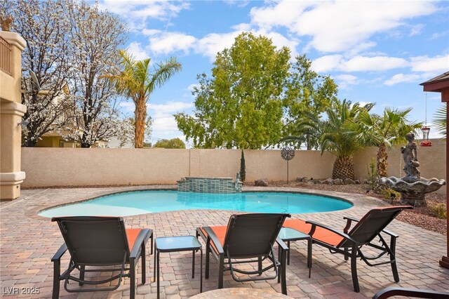 view of pool featuring a patio area, a fenced in pool, and a fenced backyard