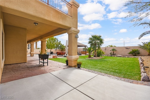 view of patio with a fenced backyard